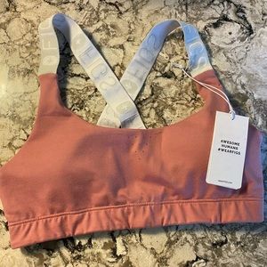 FIGS chalk pink performance sports bra